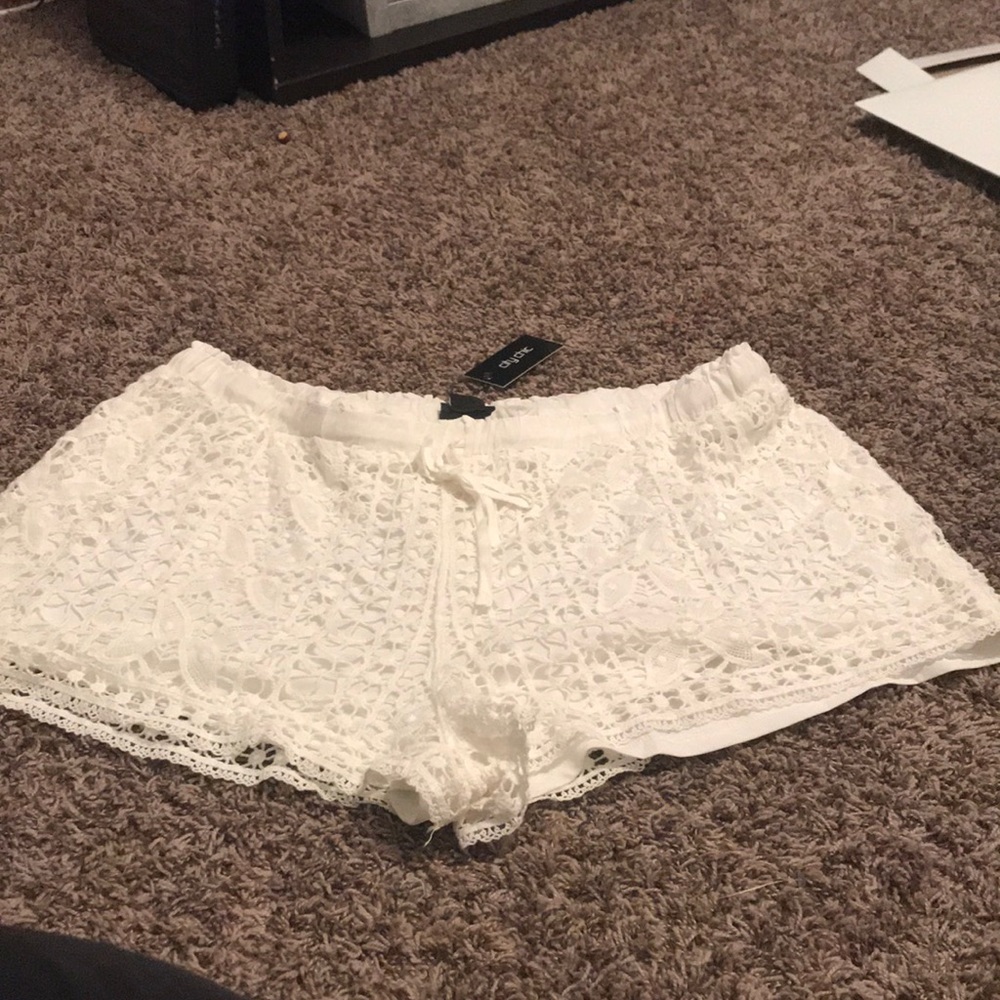 White lace shorts